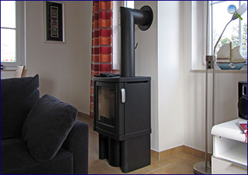 Optional: Ein Kamin sorgt im Wohnzimmer für behagliche Wärme